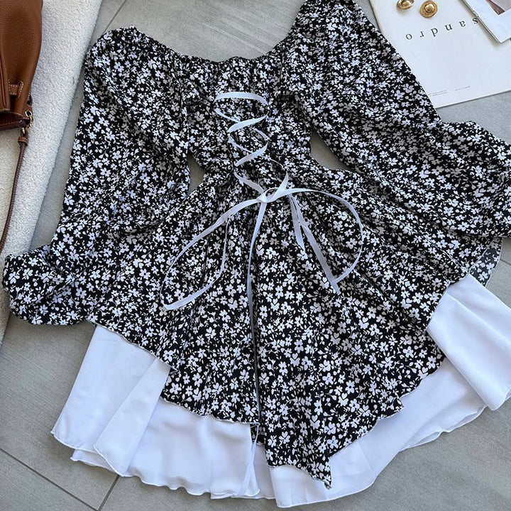 Damebluse med rynket ærme og blomsterdesign Stilla