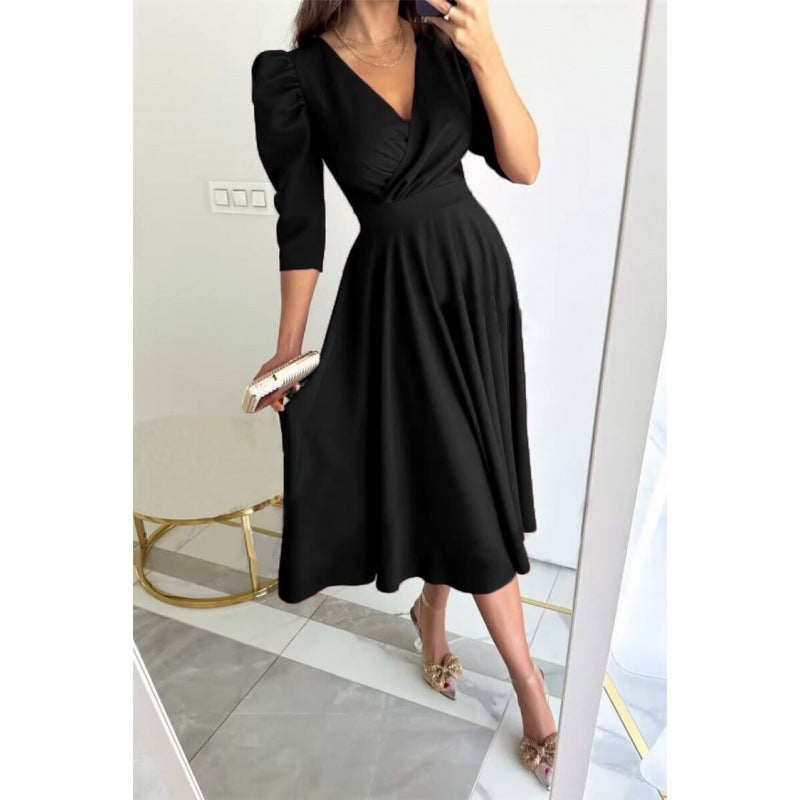 Femme Elegantes Fit-and-Flare Midi Kjole med Pufærmer Stilla