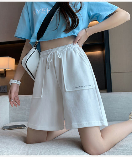 Femme Relaxed Fit Snorebånd Lounge Shorts med funktionelle lommer Stilla