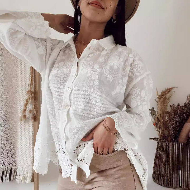 Dame elegant spids bluse med florale broderier og knaplukning Stilla