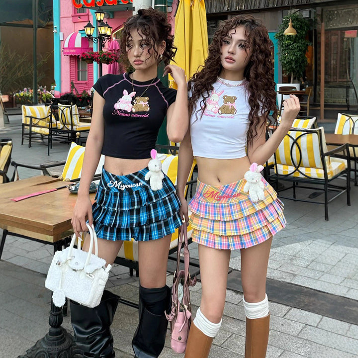 Dame Mini skirt in playful check design with ruffle details Skovae