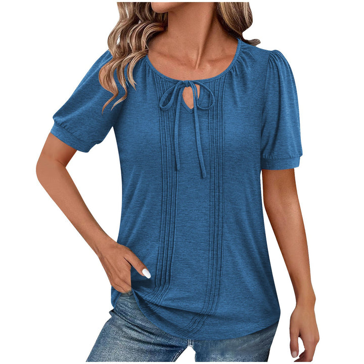 Damebluse med puffærmer og raffineret halterneck Stilla
