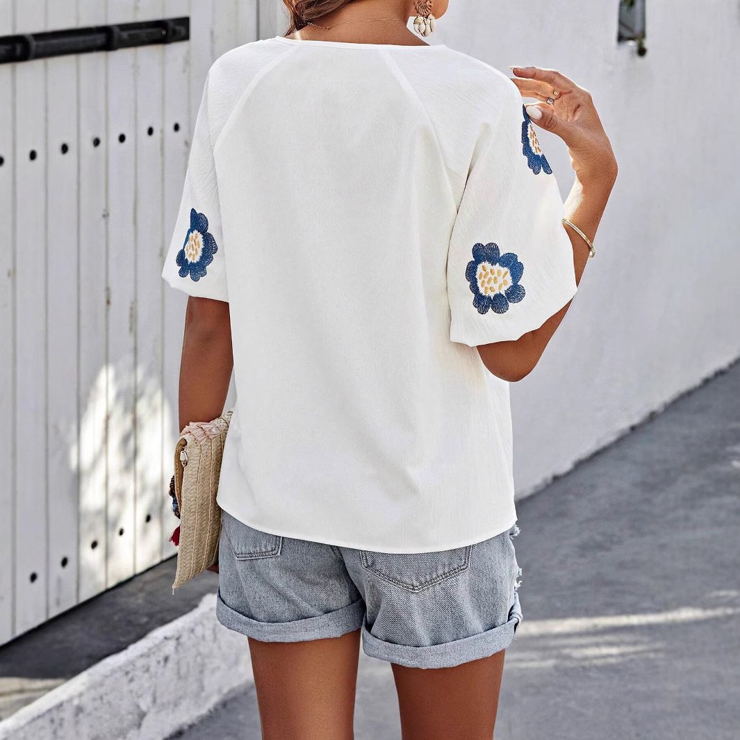 Dame alsidig bluse med florale detaljer Stilla