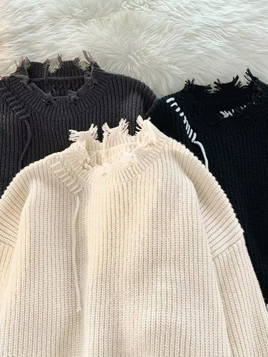 Dame Oversized Pullover med moderne frynser og unikke kontrastsyninger Stilla
