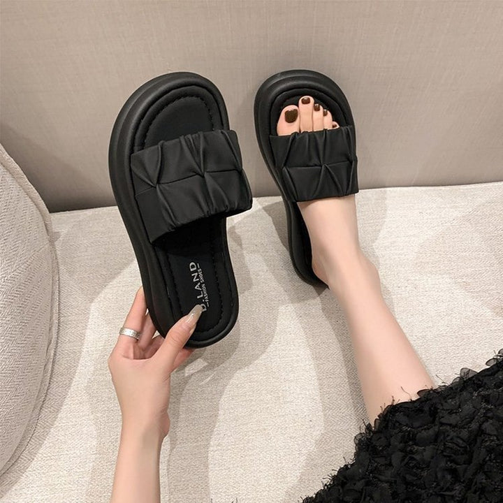 Dame slippers med moderne plisseret design og komfortabel bund Stilla