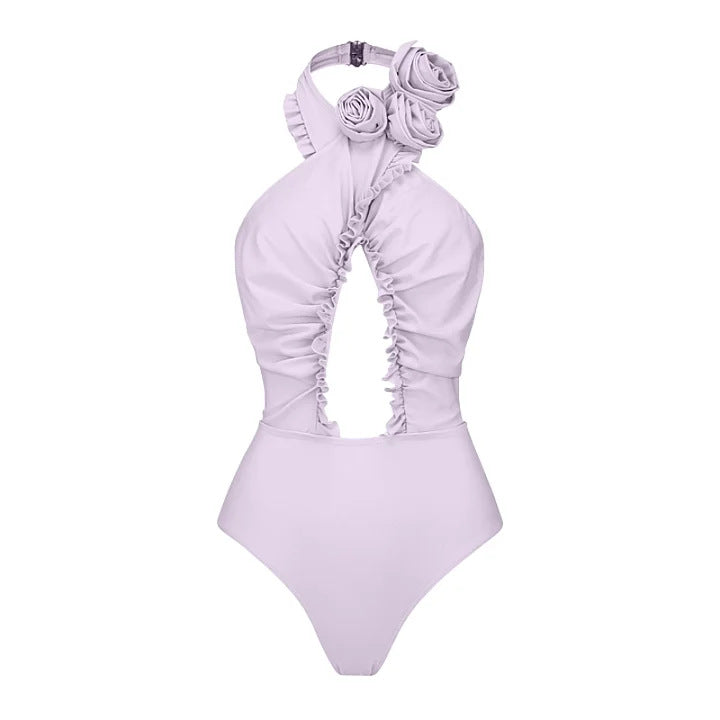 Dame svømmedragt med blomstret design og raffineret cut-out-look Skovae