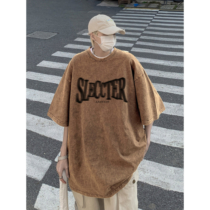 Dame oversized T-shirt med trendy urban grafisk design Stilla