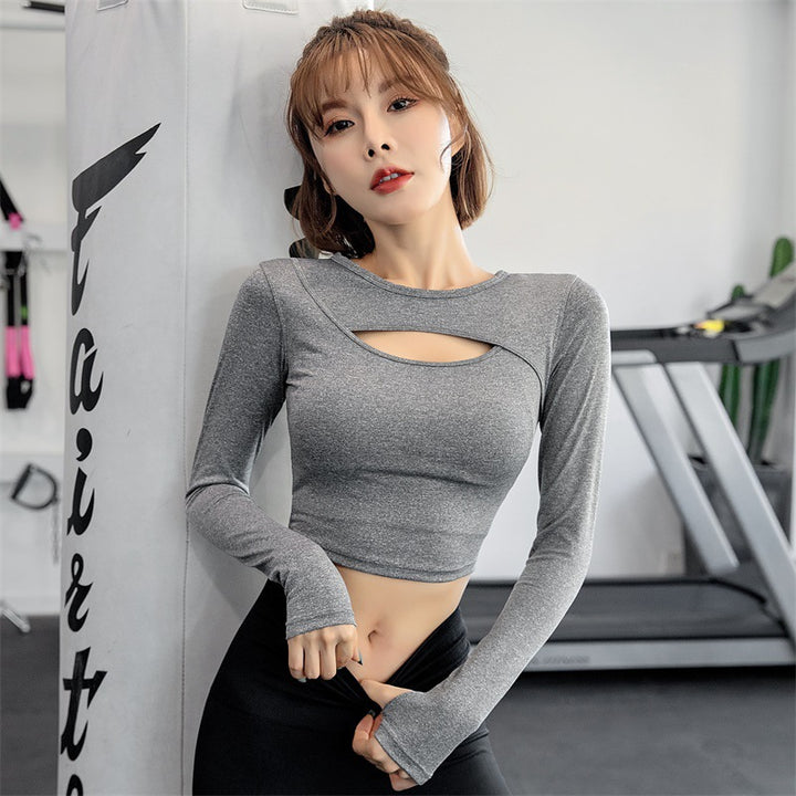 Dame Sportsligt Langærmet Crop-Top med moderne Cut-Out-design og figursyet snit Stilla