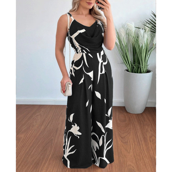 Dame jumpsuit med flydende snit og dekorative blomster motiver Stilla