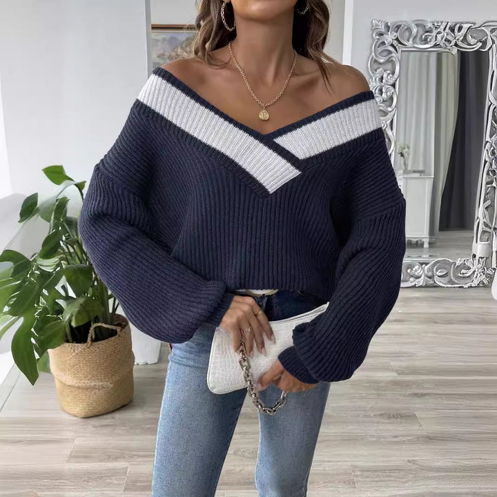 Dame V-Hals sweater med struktureret strikkemønster og kontrasterende ribdetaljer Stilla