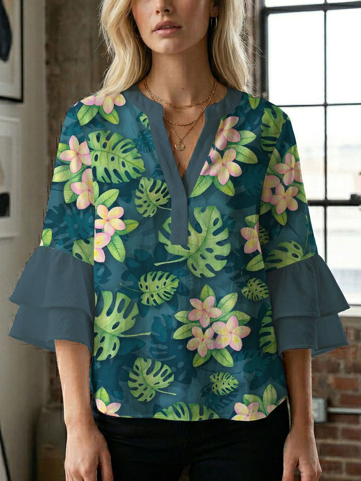 Dame bluse med voluminøse ærmer og kreativt trykdesign Skovae