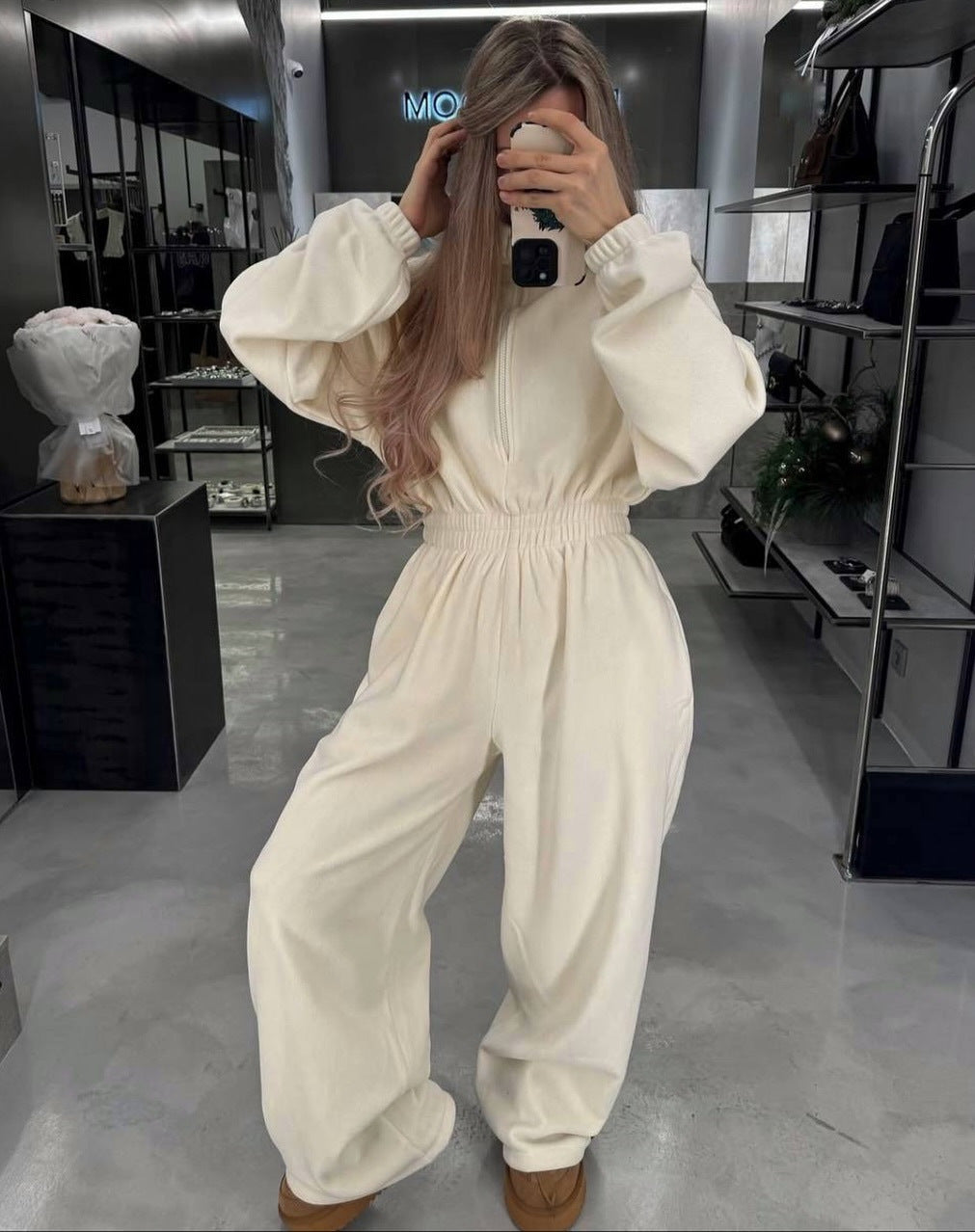 Kvinders fleece jumpsuit med høj krave og praktisk lynlås Skovae