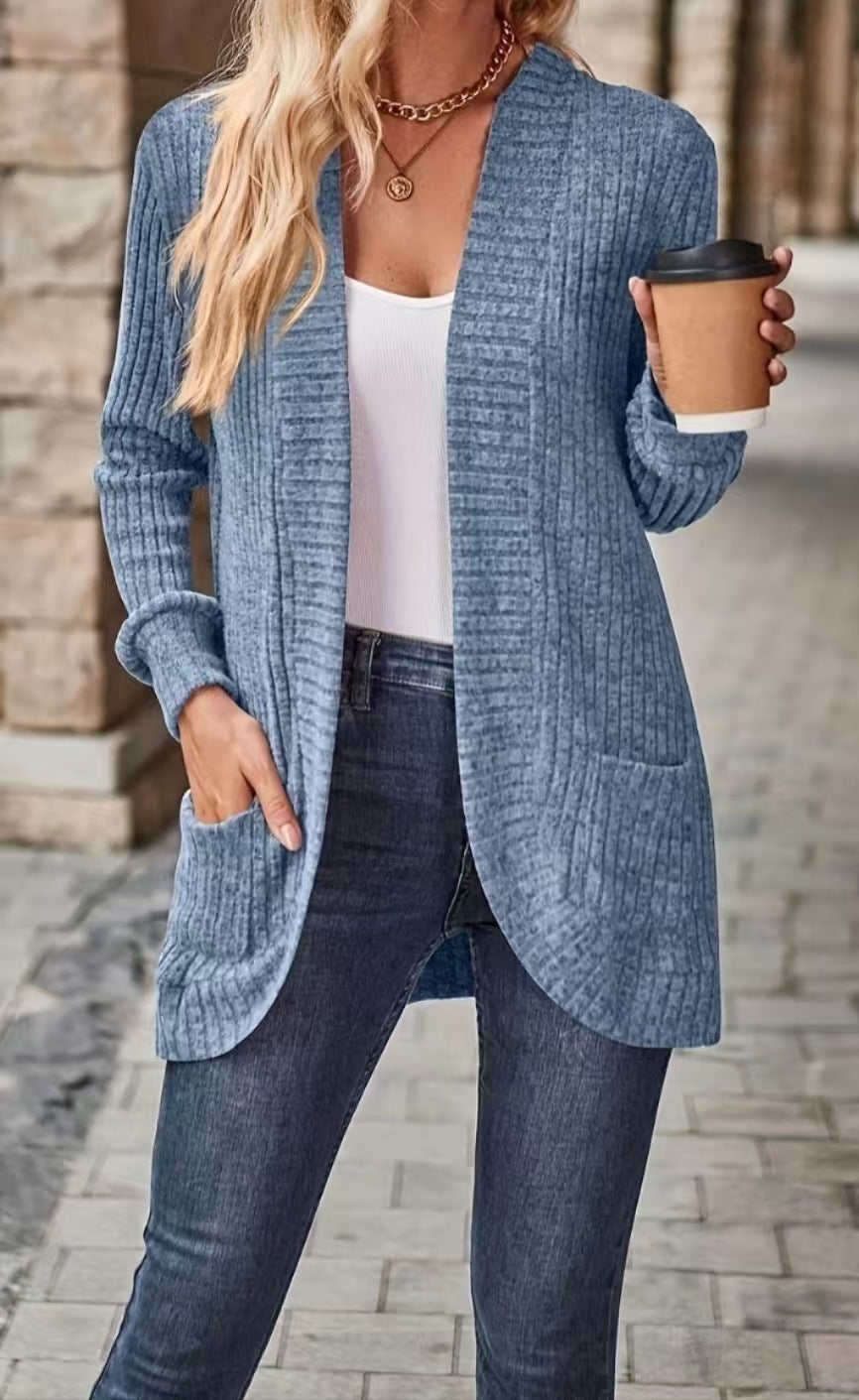 Dame afslappet strikjakke med lommer og struktureret design Stilla