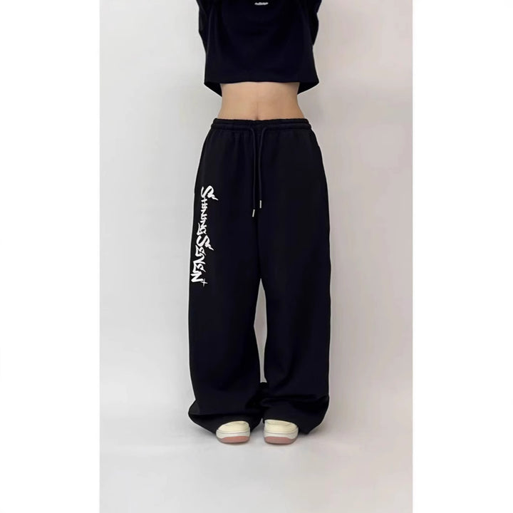 Kvinders casual joggingbukser med bred pasform og sportsgrafik Skovae