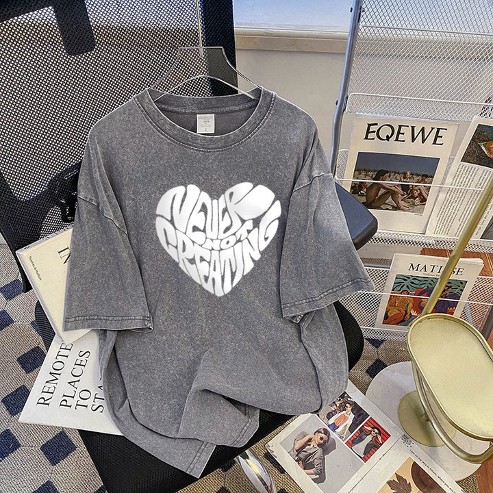 Dame Oversized T-shirt med kreativt hjerte-motiv og afslappet skrifttype Stilla