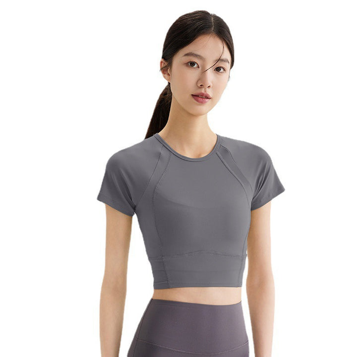 Dame sporty kortærmet crop-top med åndbare indsatser og elastisk pasform Stilla