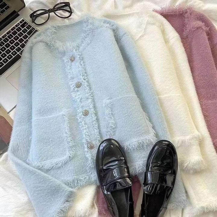 Kvinders elegante fleecejakke med fashionable knapdetaljer Stilla