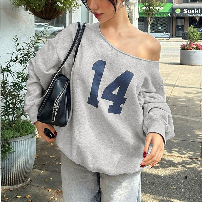Dame sporty oversized pullover med off-shoulder skæring og iøjnefaldende print Stilla