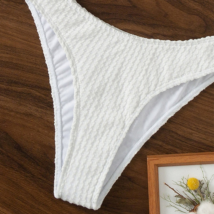 Dame bikini-sæt med struktureret top og elegant ringdetalje Stilla