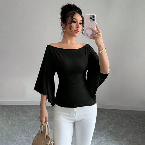 Kvinders elegante off-shoulder top med brede ærmer og tætsiddende pasform Stilla