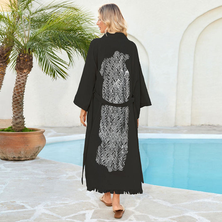 Damer luftig strandkimono med elegant snit og frynset accenter Stilla