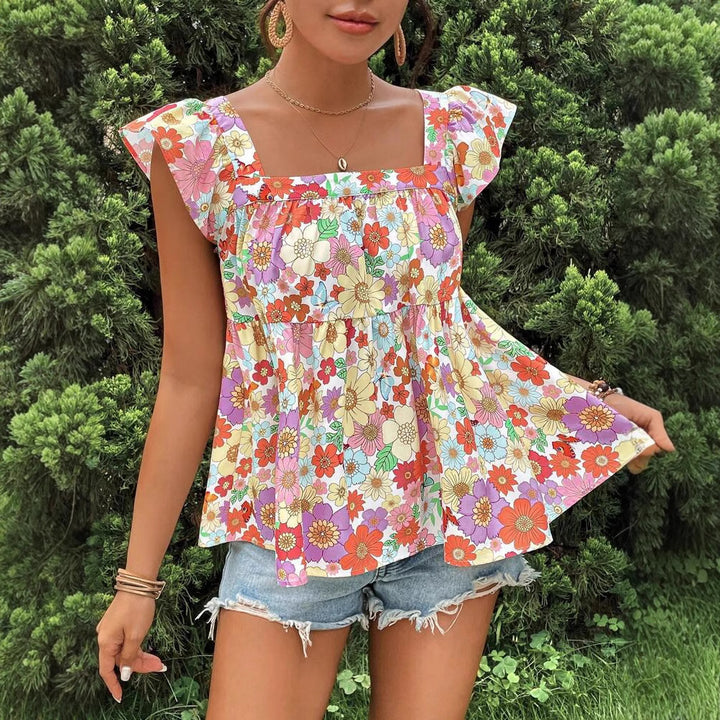Dame bluse top med floralt print og flæsedetaljer Stilla