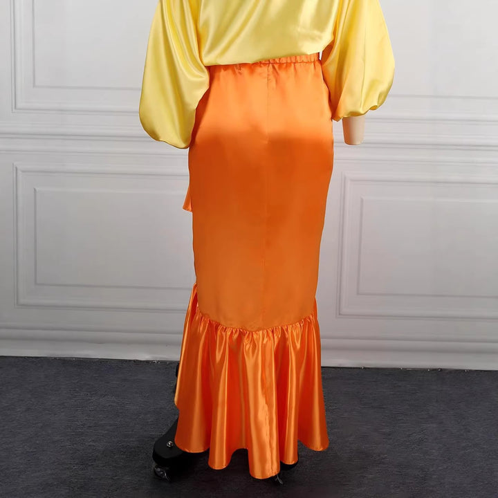 Dame Elegant satin skirt with asymmetric design and voluminous ruffle finish Skovae