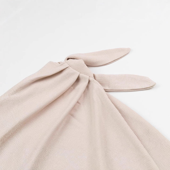 Dame sarong med elegant knude og flydende materiale Stilla