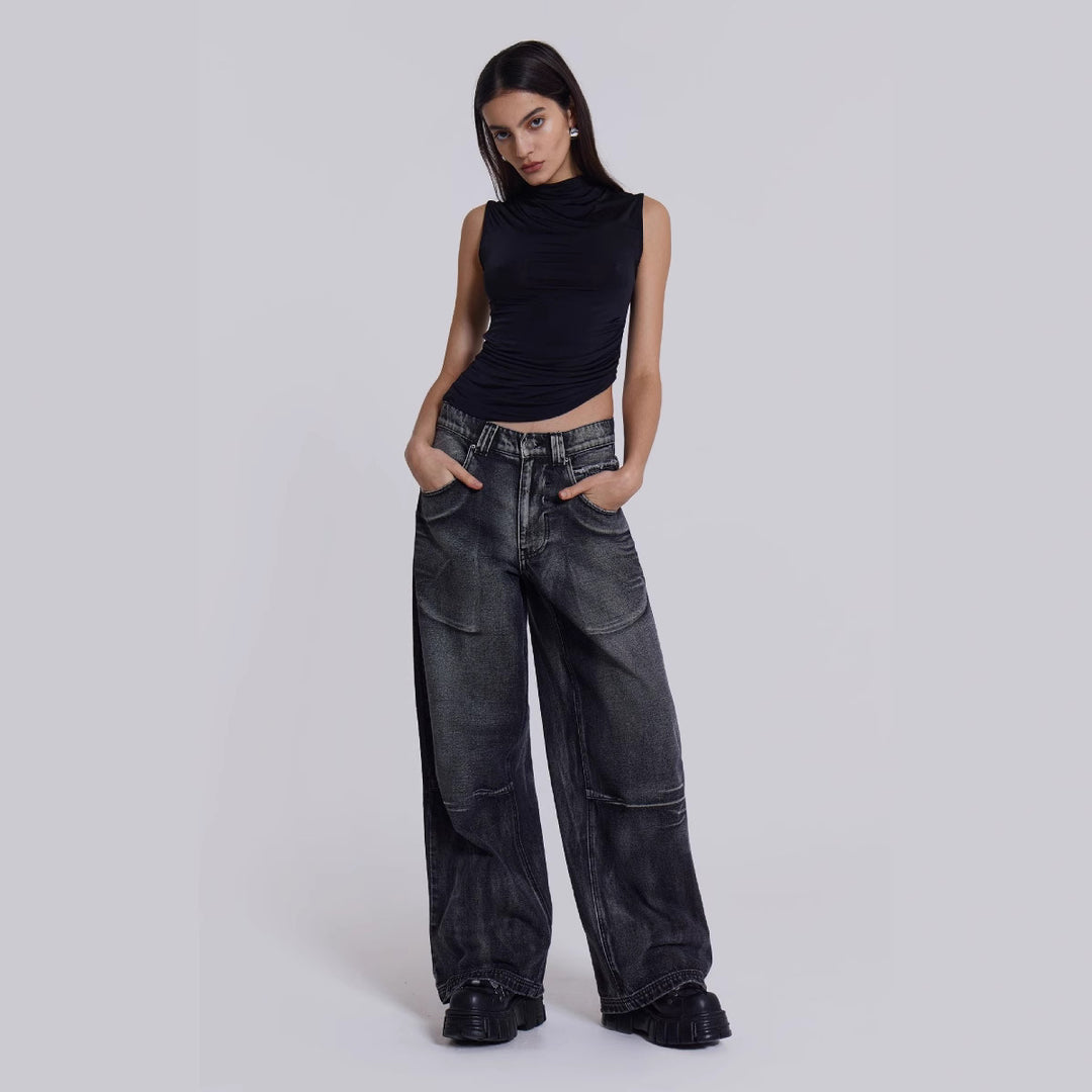 Dame Løst skårede jeans med iøjnefaldende englevinge-design og moderigtig brugt-look Stilla