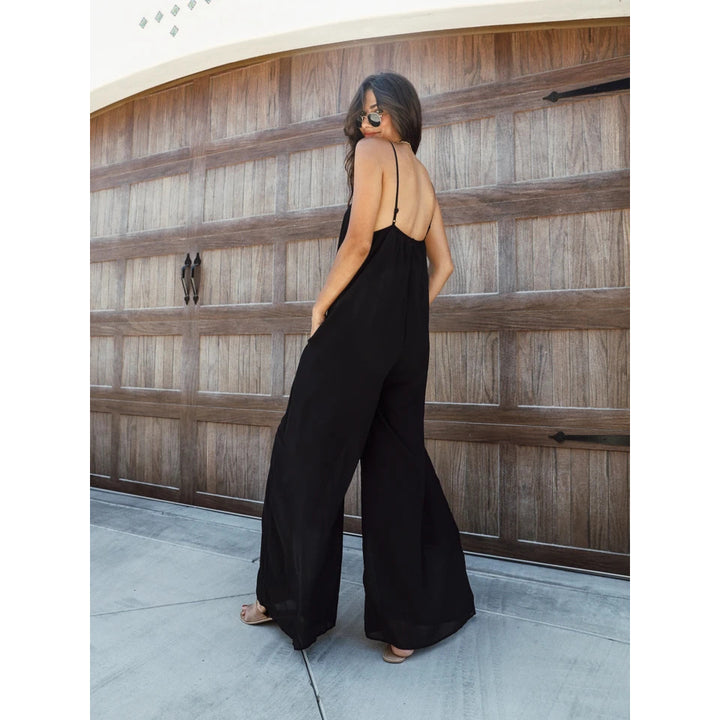 Damer Luftig Jumpsuit med bred pasform og justerbare stropper Stiila