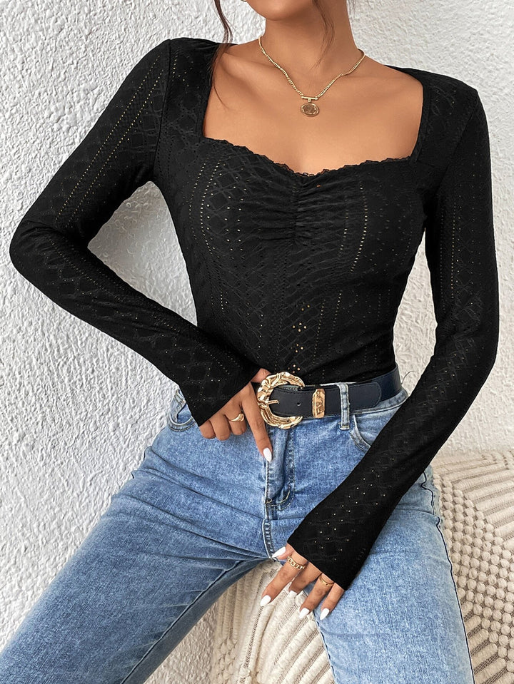 Kvinders langærmet bodysuit med firkantet udskæring og elegante flæser Stilla