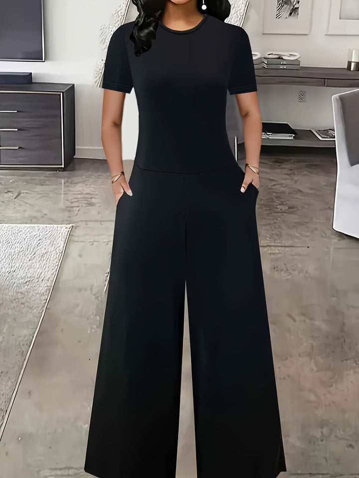 Dame Elegant Jumpsuit med bredt ben og moderigtig rund halsudskæring Stilla