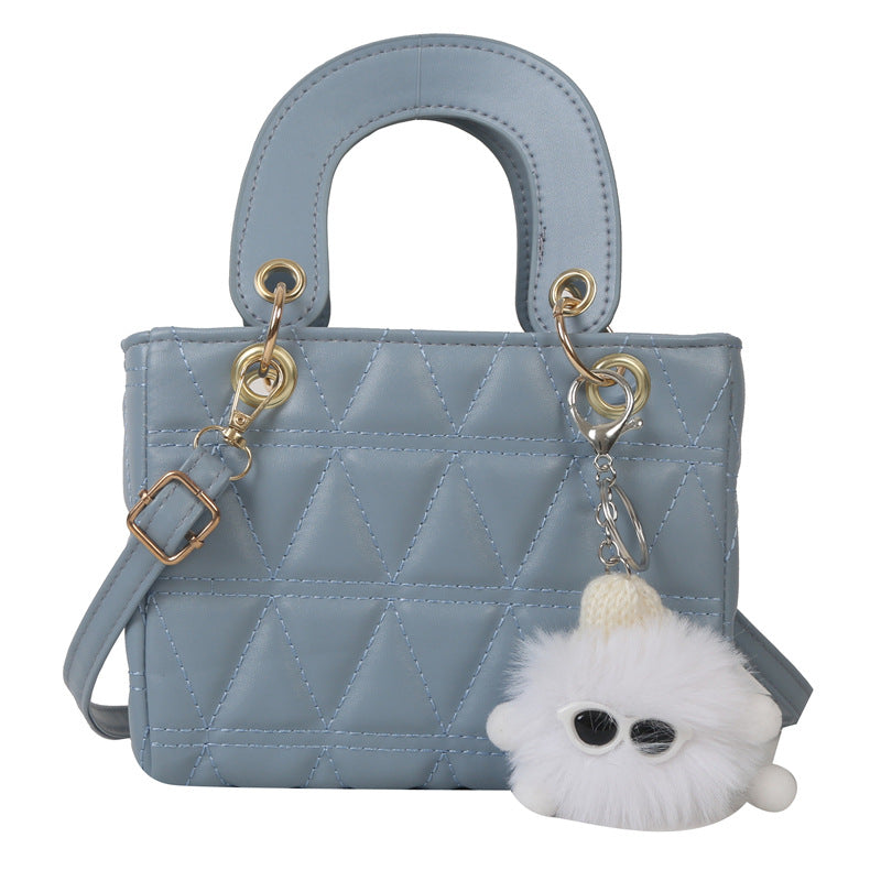 Femme quilted håndtaske med aftagelig charme Stilla