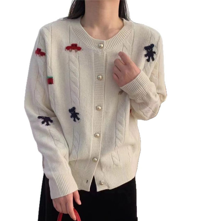 Kvinders hyggelige strikkede cardigan med legende design og praktiske knapper Stilla