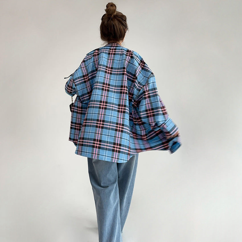 Dame Oversized Skjorte i ternet design med casual snit, lange ærmer og praktiske brystlommer Stilla