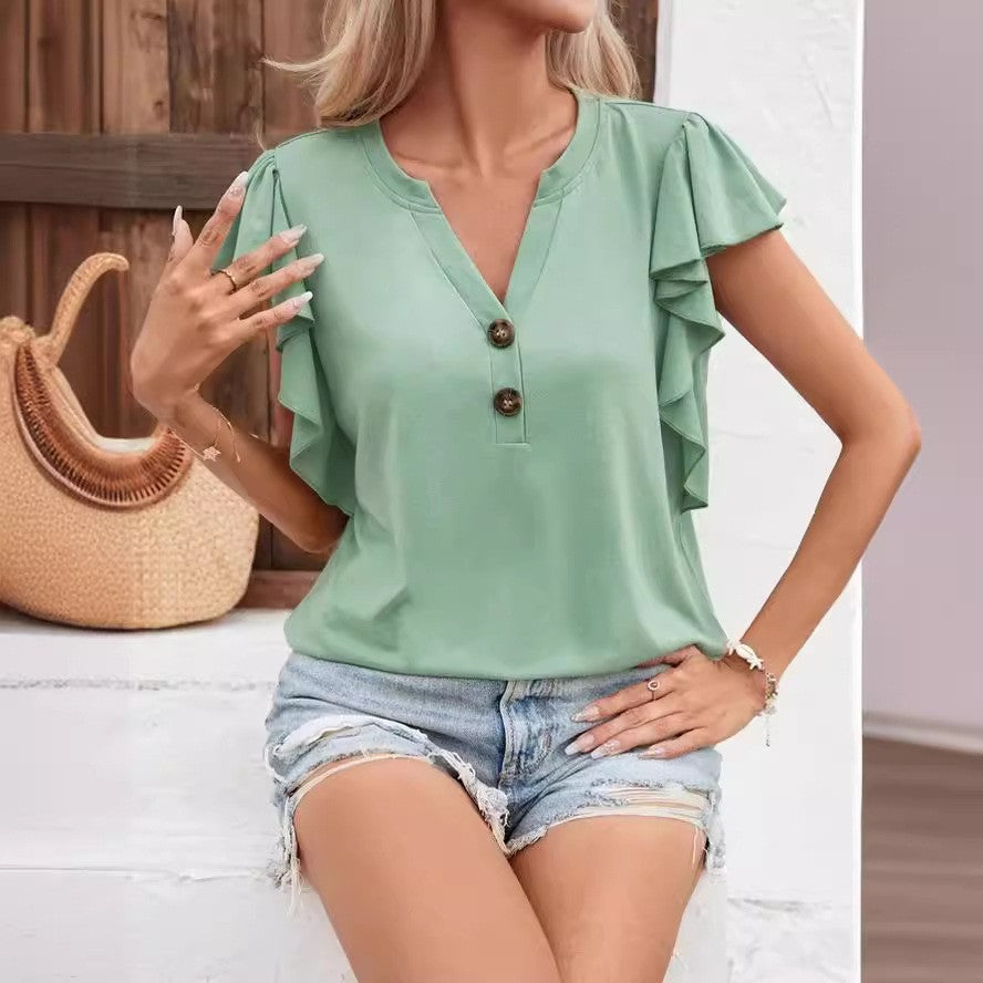 Damebluse med flydende flæser og elegante knapdetaljer Stilla
