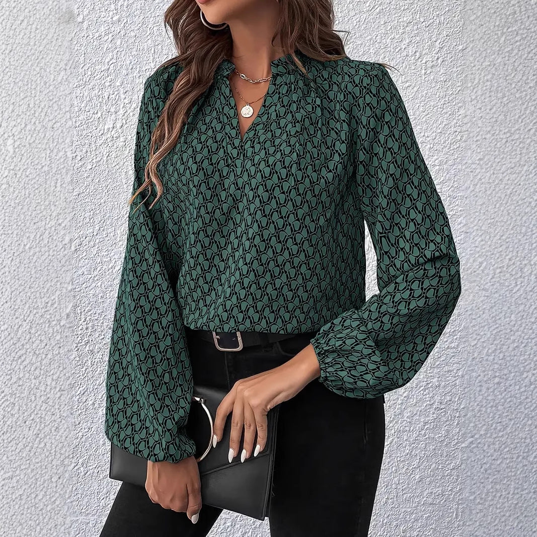 Damebluse med moderne geometrisk mønster og elegant kraveparti Stilla