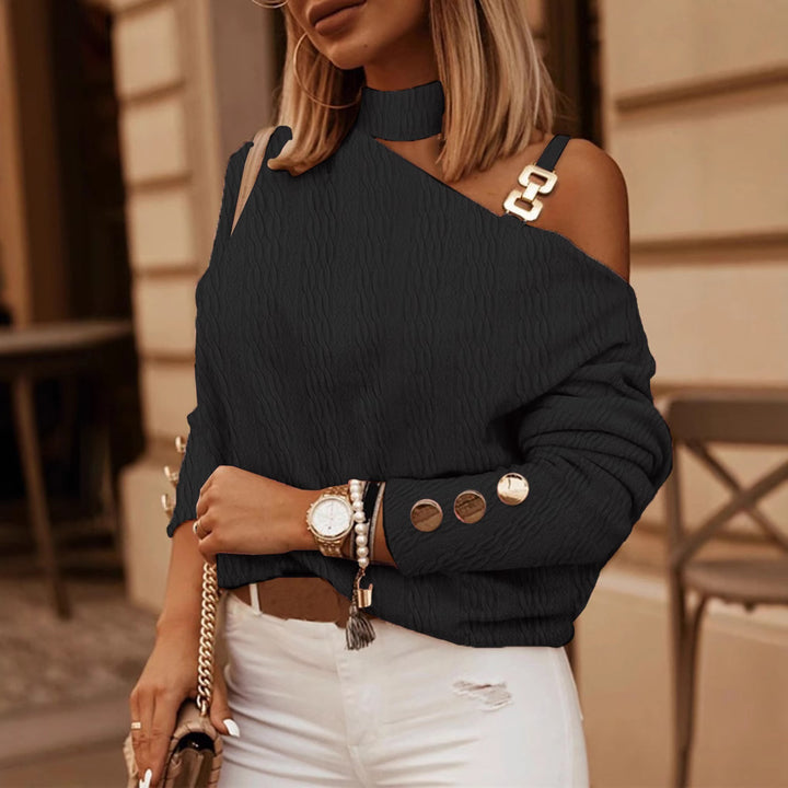 Dame elegant strikbluse med asymmetriske cut-outs og dekorative knapdetaljer Stilla