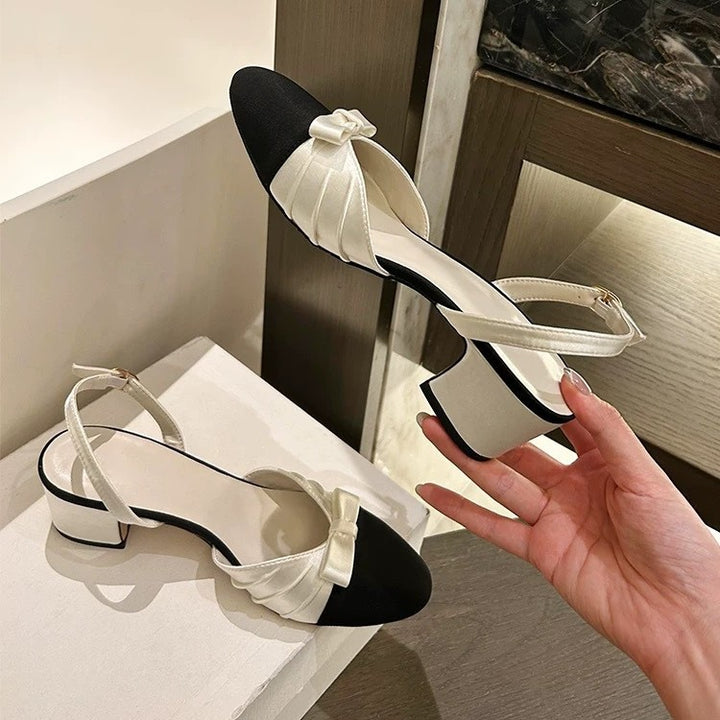 Dame Slingback-pumps med elegant satindetalje og struktureret sål Stilla