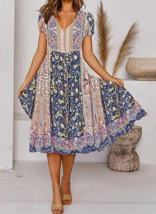 Dame Boho inspireret Midikjole med blomsterprint og V-udskæring Stilla