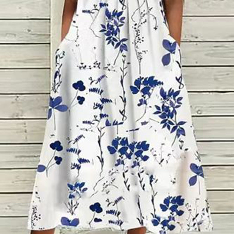 Dame sommerligt fritidskjole med spidsærmer og original blomstertryk Stilla