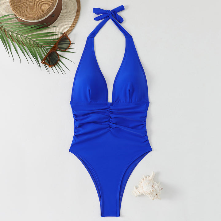 Dame one-piece badedragt med dyb V-udskæring og moderne drapering Skovae