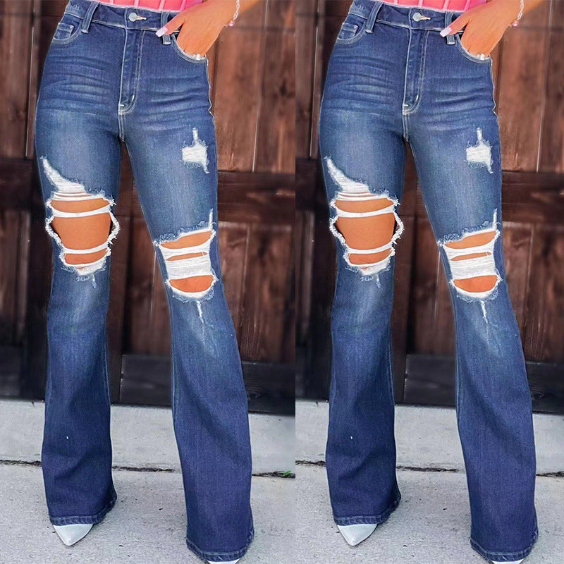 Dame udvidede jeans med fashionable beskadigede effekter og høj talje Skovae