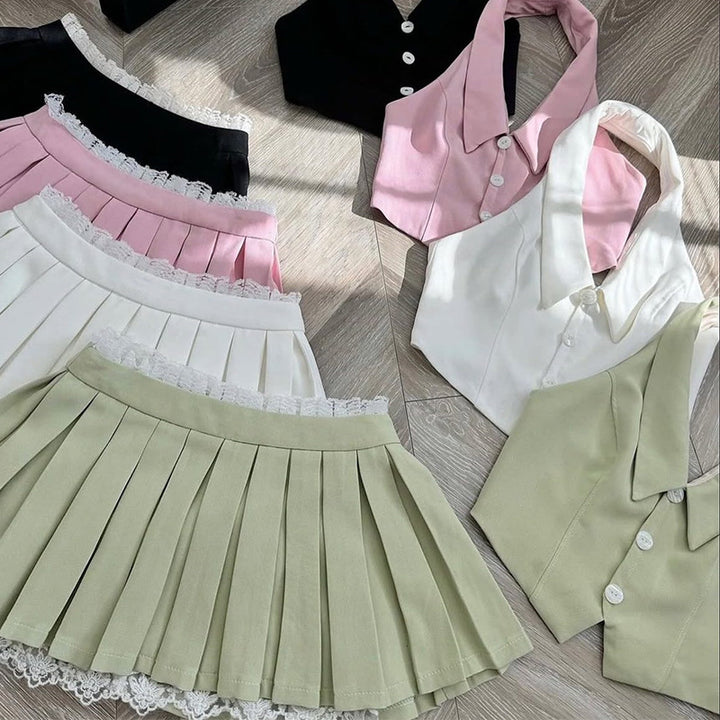 Dame cropped bluse med aftagelig krave og elegante knapdetaljer Stilla