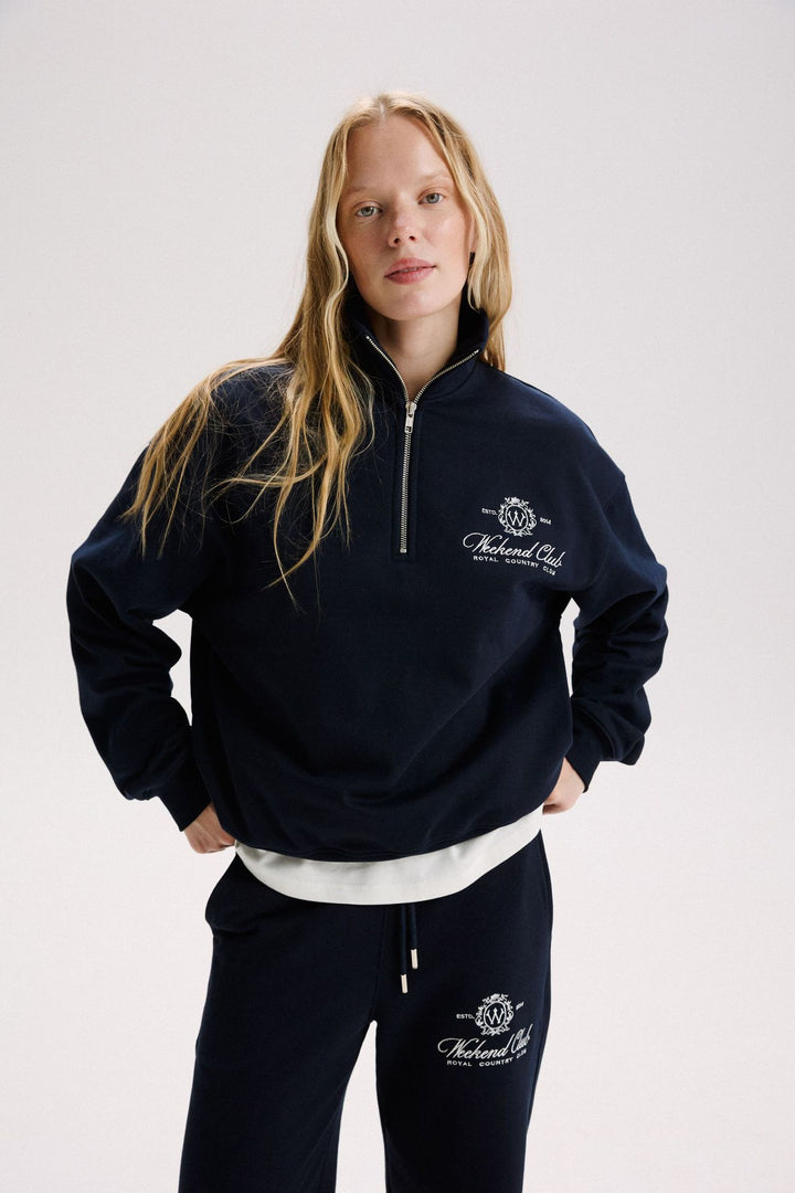 Kvindernes sporty zip-pullover med en afslappet pasform og elegant broderi Stilla