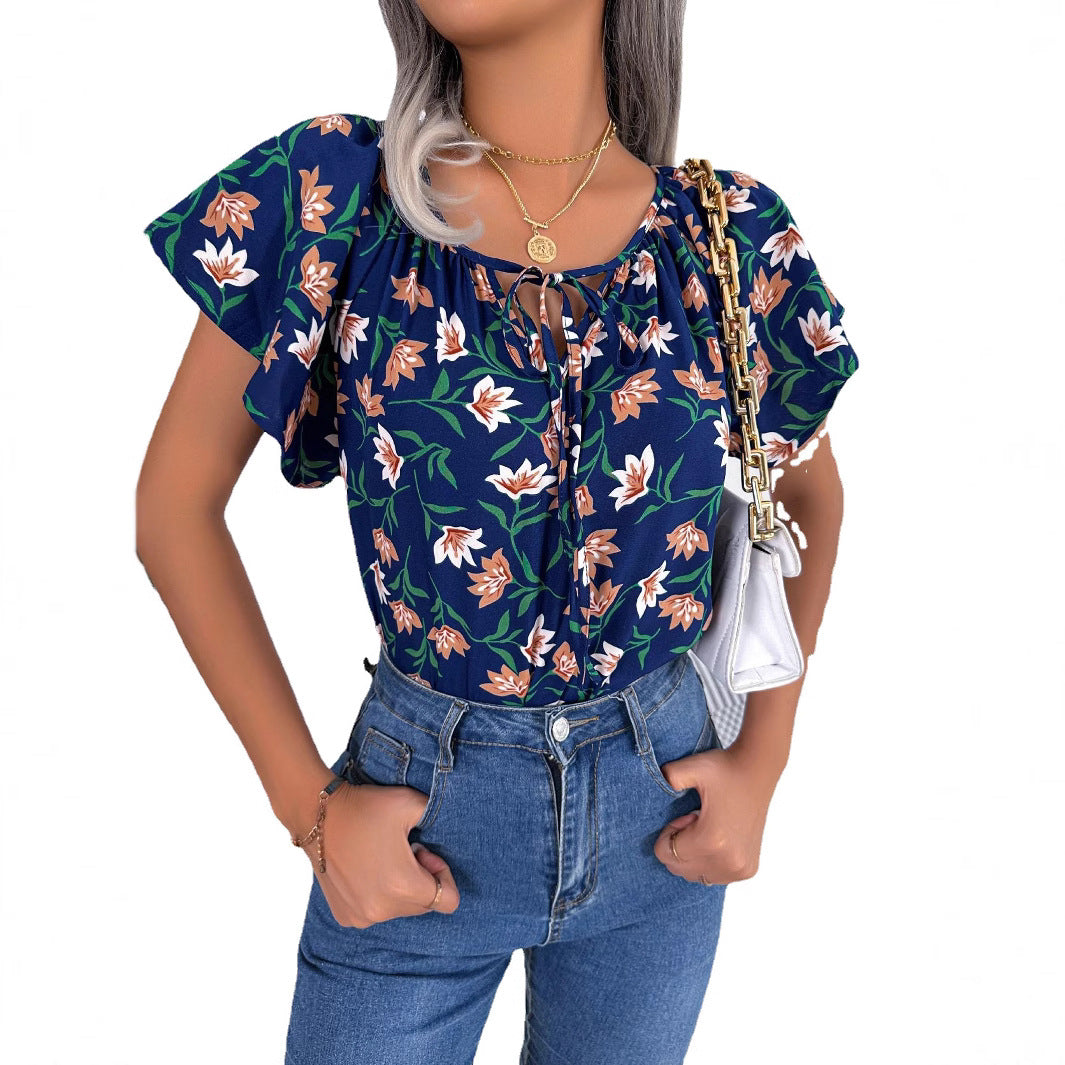 Damebluse med blomsterprint og elastiske ærmer Stilla