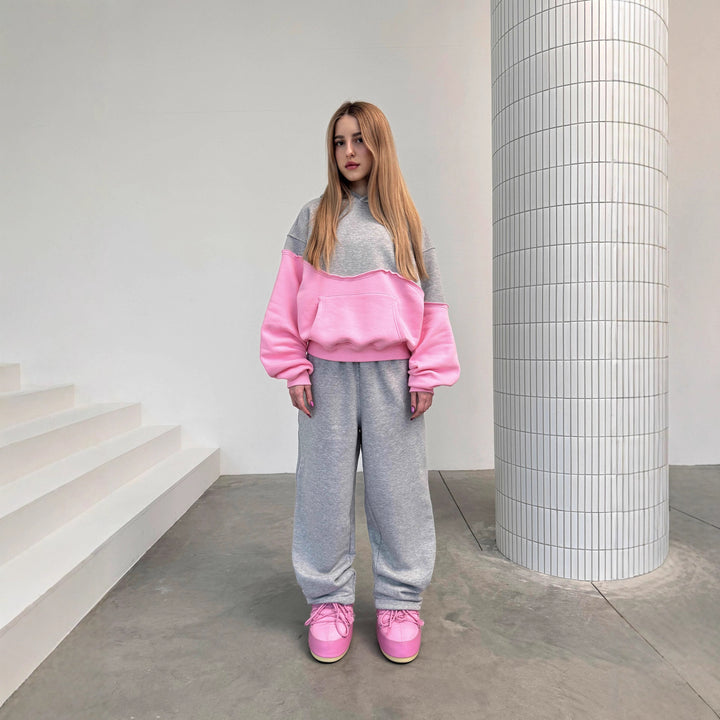 Kvinders fashionable sweatsuit med kontrasterende elementer