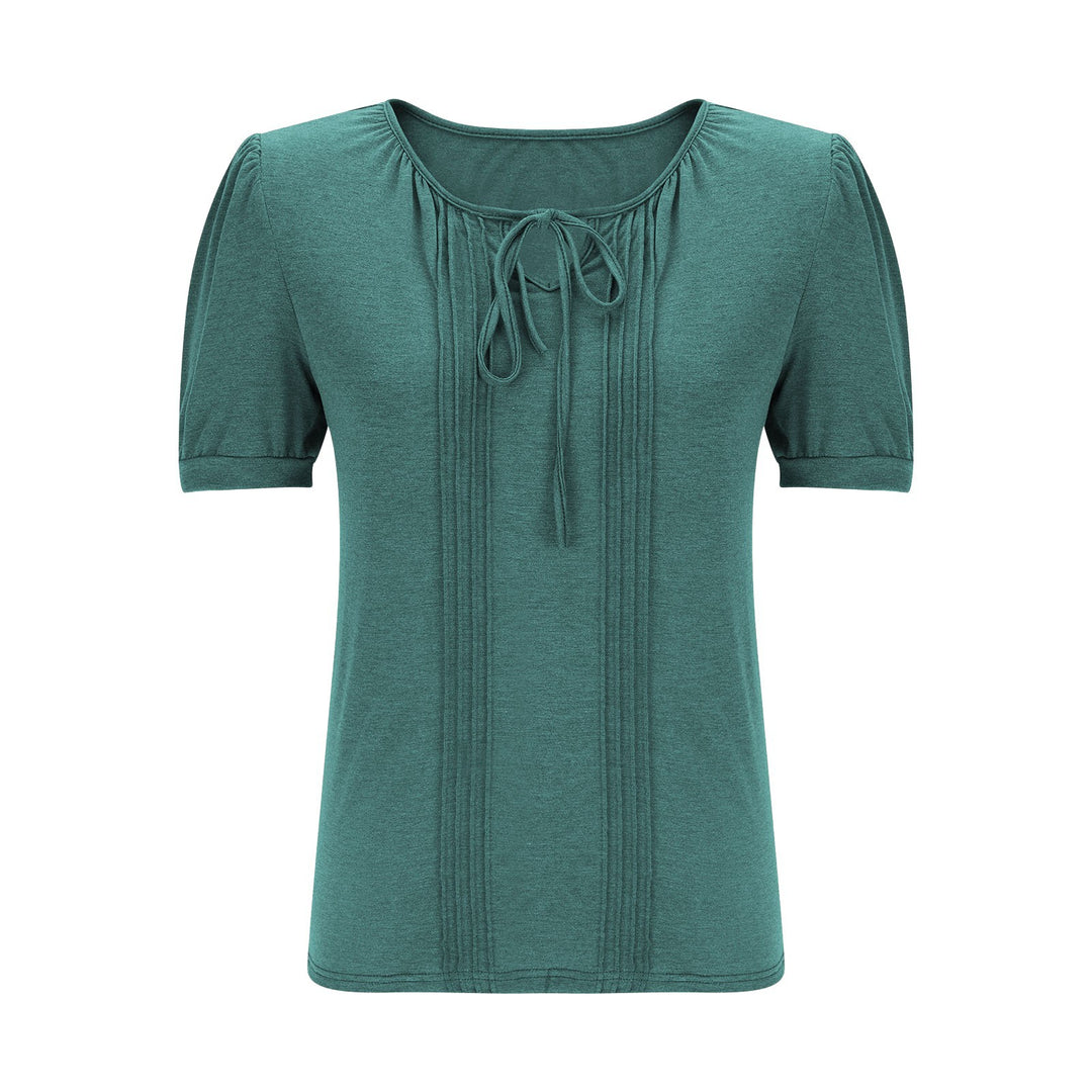 Damebluse med puffærmer og raffineret halterneck Stilla