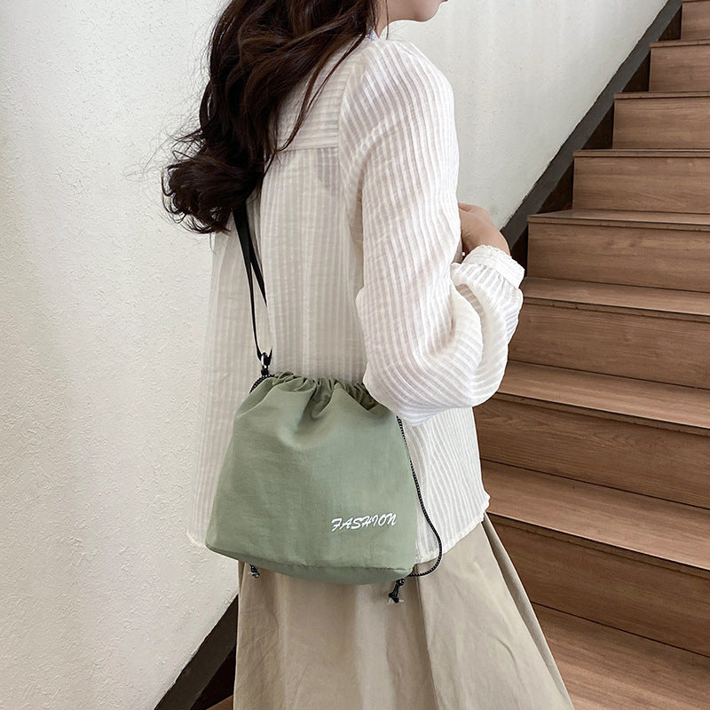 Femme Alsidig Snørebånd Bucket Bag Stilla