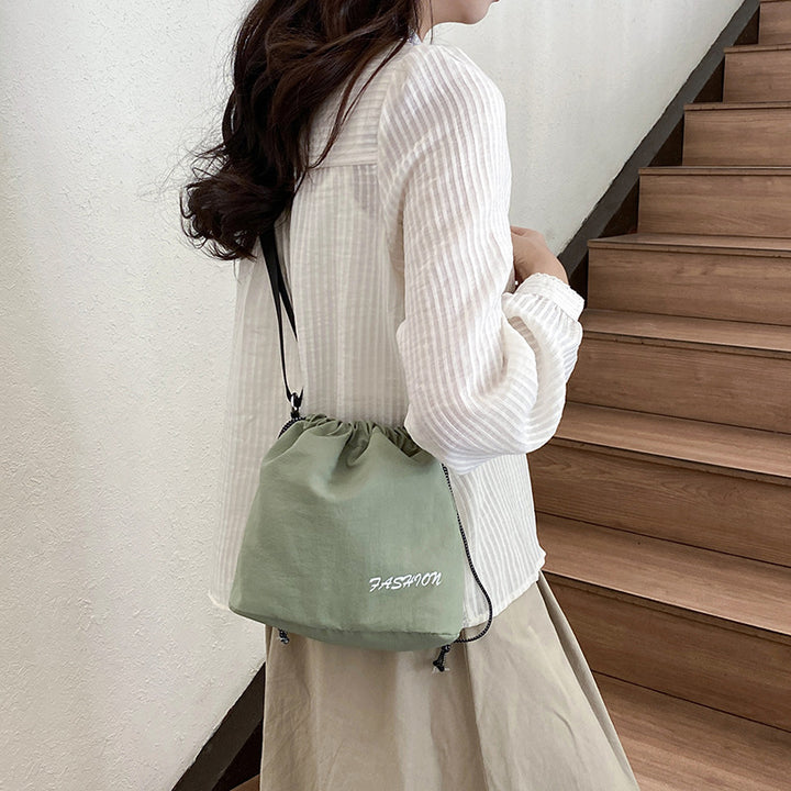 Femme Alsidig Snørebånd Bucket Bag Stilla